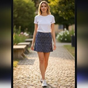 NWT Golftini Women's Navy Zodiac Patterned Mini Ruffle Tech Skort Size-XS